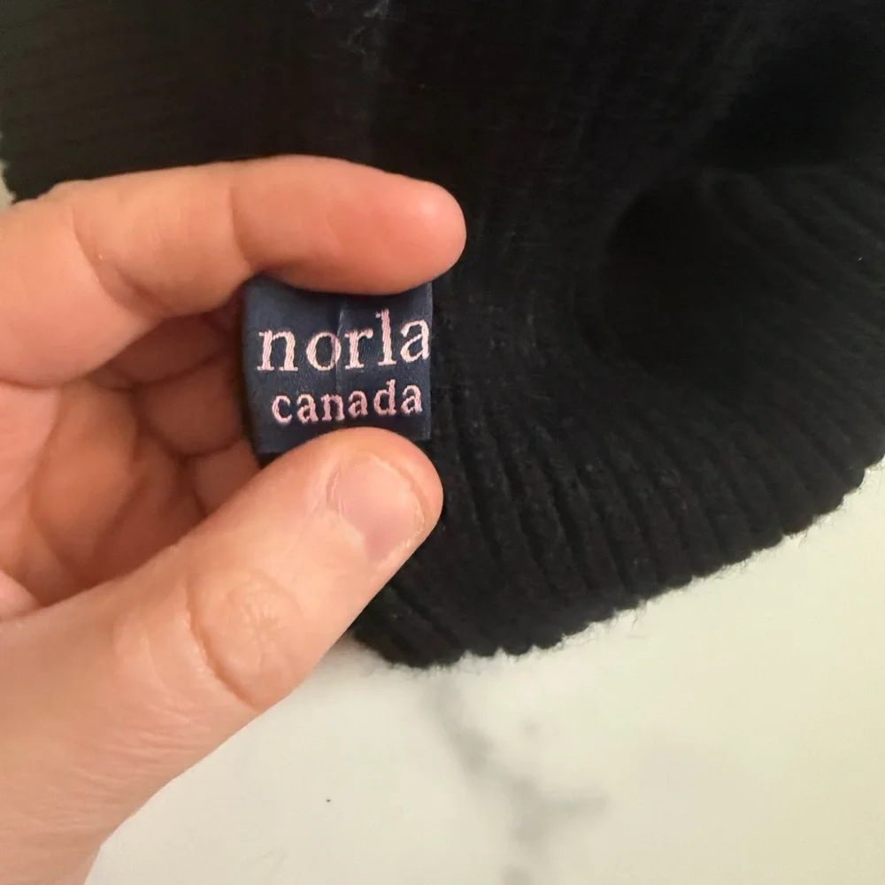 Like New- Norla Canada- Black Knit with gray Pom-Pom Beanie. - Picture 2 of 2
